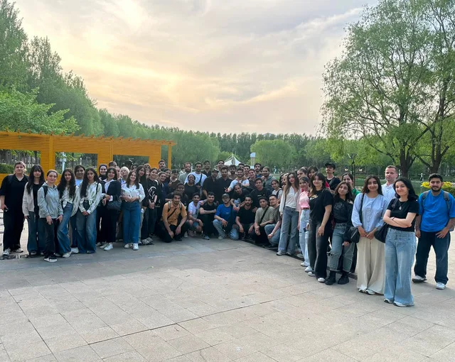 UM International students gathered together on a partner university campus
